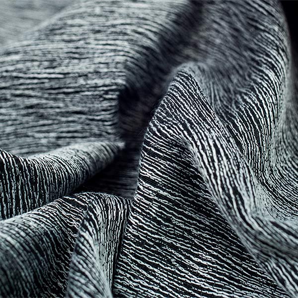 FR blackout fabric with relief jacquard design width cm. 330.<br /> 100% Made in Italy fabric. Style modern and trendy with plain, jacquard structures and stripes decorations.

 Treatments: soft hand. Type of workings: jacquard. 