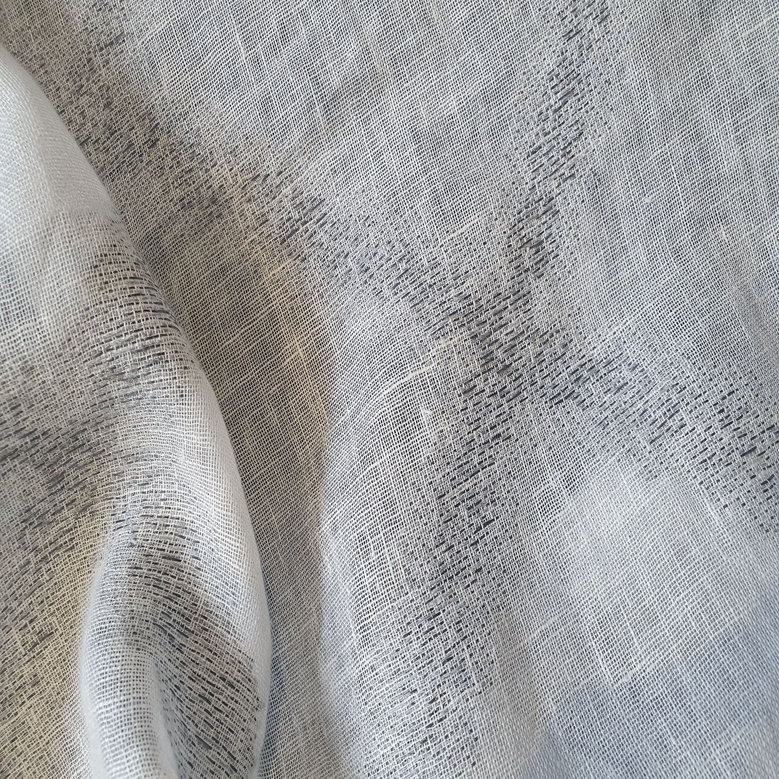 LI391531 WHIDE CM 330 85%LIN 7%PL 8%COT
Jacquard net weaving   100% linen soft finishing.<br /> 100% Made in Italy fabric. Style modern, rustic and trendy with fancy, plain, jacquard structures, small drawings and stripes decorations.

 Treatments: antibacterial and soft standard. Type of workings: jacquard. 