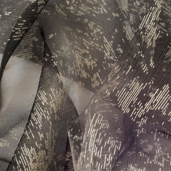 Burnout marbled design on jacquard light organza ground knot texture.<br /> 100% Made in Italy fabric. Style modern and trendy with fancy, plain and jacquard structures decorations.

 Treatments: soft hand. Type of workings: Devore and jacquard. 