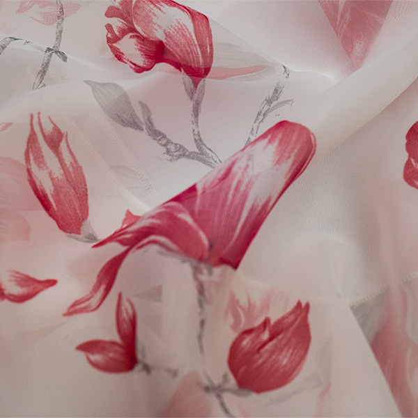 Pigment print on voile.<br /> 100% Made in Italy fabric. Style modern and trendy with fancy and flowers decorations.

 Treatments: soft standard. Type of workings: pigment print. 