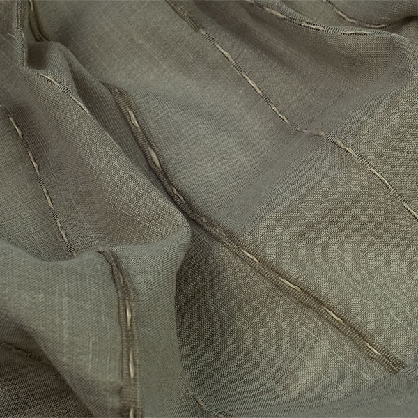 Linen blend jacquard 3d plisseè with sewing effect.<br /> 100% Made in Italy fabric. Style modern and trendy with plain, jacquard structures, small drawings and stripes decorations.

 Treatments: embossing 3D effect and soft hand. Type of workings: jacquard and pleated. 